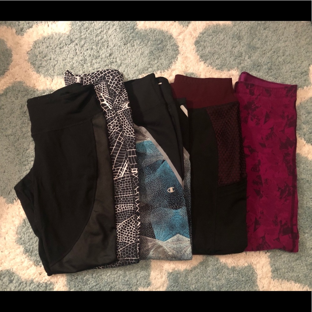 Five pairs of workout pants all size medium